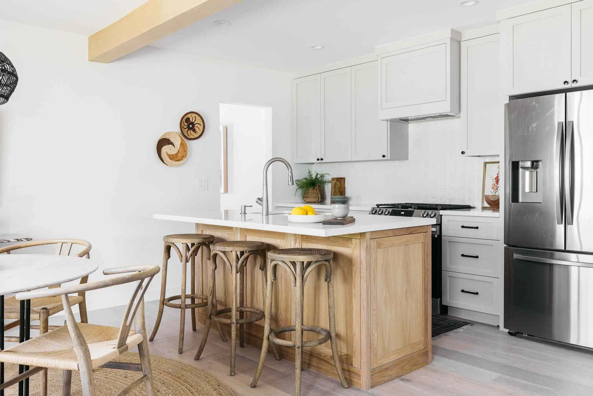 Discover multi-use breakfast bars with smart storage solutions for functional Apartment Kitchens by Kitchen Renovations Hamilton.